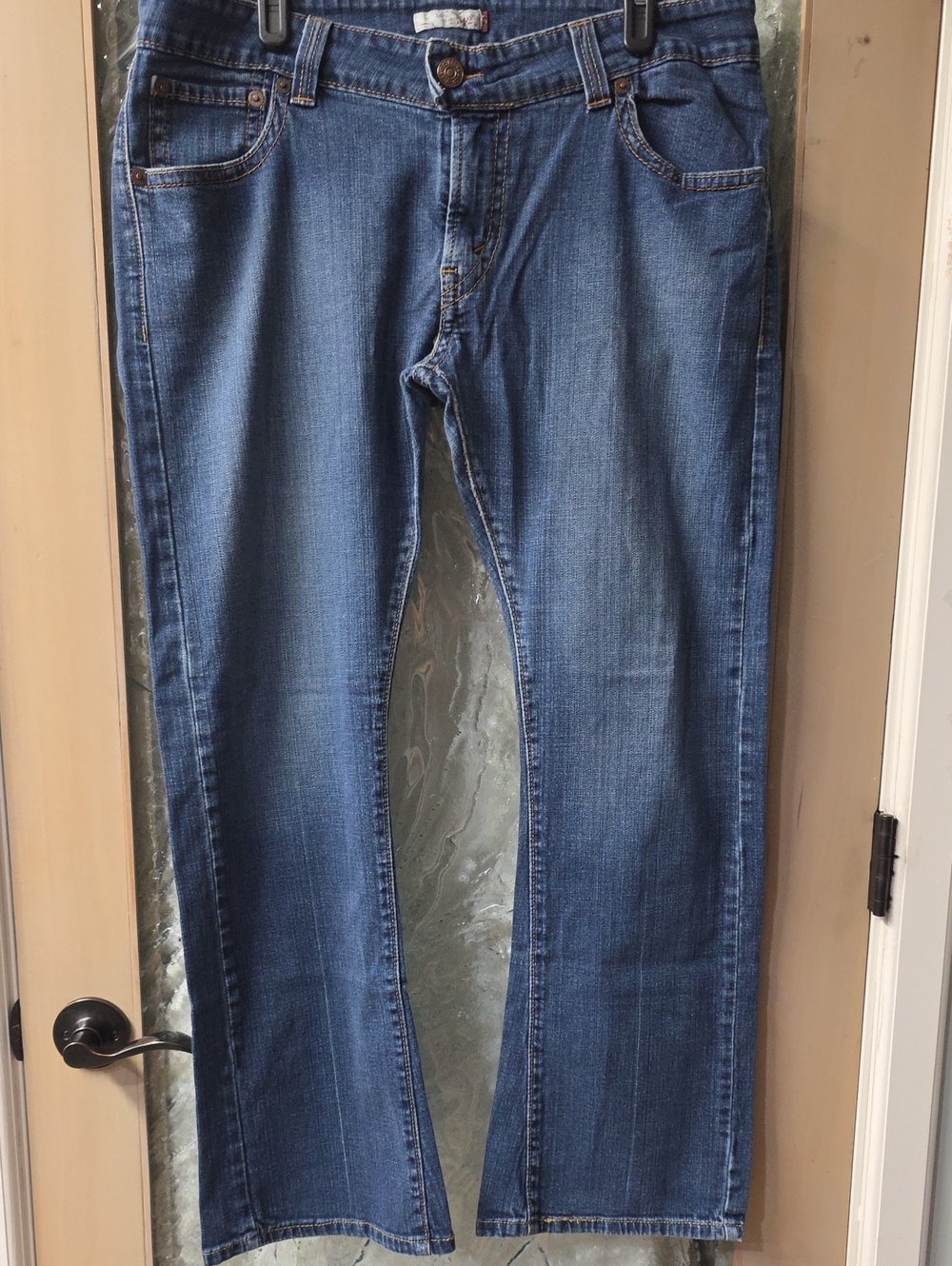 Vintage Levi's 542 Low Flare Jeans in Medium Blue Wash